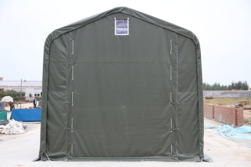 Large outdoor storage tent for RVs and machinery with closed front doors