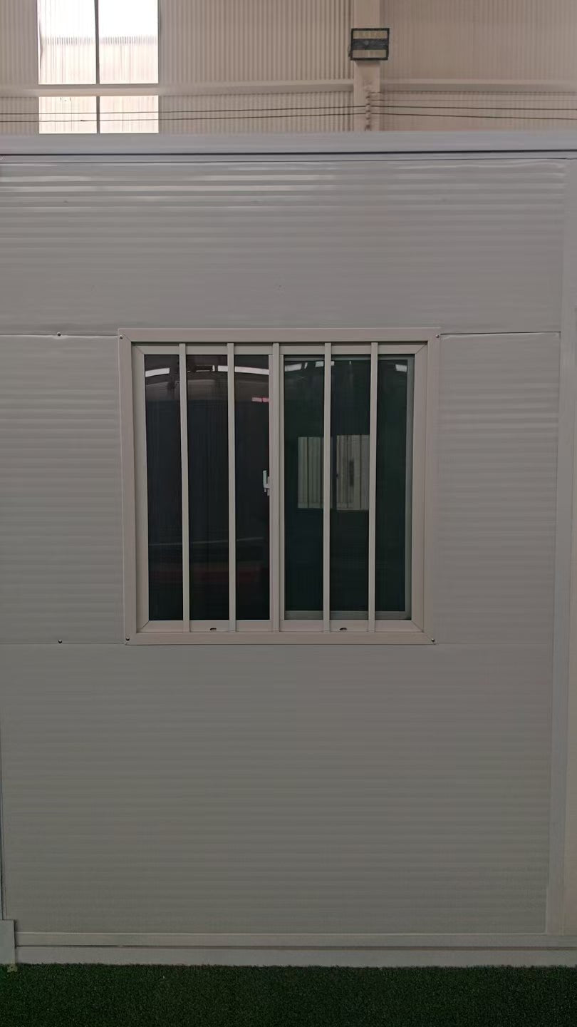 Exterior Image: Portable 19 FT Folding Insulated Container Office with Lockable Door – Outdoor View

Interior Image: Inside View of Modular Prefab Cabin Office with Window and Electrical Plug

Folded View: Foldable Prefab Container for Easy Transport and Setup

Setup Process: Step-by-step Setup of 19 FT Folding Steel Container Office

Multiple Angles: Various Views of the Portable Modular Work Cabin