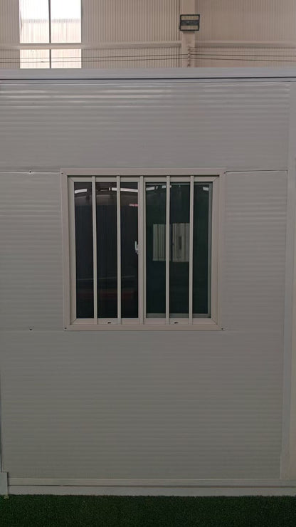 Exterior Image: Portable 19 FT Folding Insulated Container Office with Lockable Door – Outdoor View

Interior Image: Inside View of Modular Prefab Cabin Office with Window and Electrical Plug

Folded View: Foldable Prefab Container for Easy Transport and Setup

Setup Process: Step-by-step Setup of 19 FT Folding Steel Container Office

Multiple Angles: Various Views of the Portable Modular Work Cabin