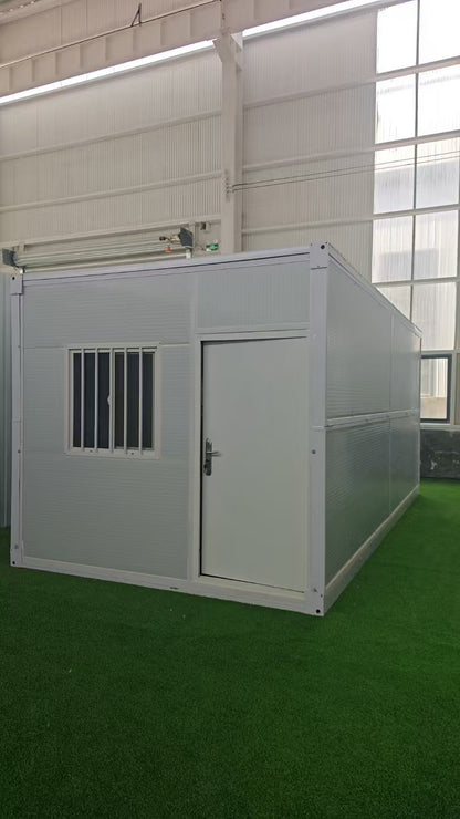 Exterior Image: Portable 19 FT Folding Insulated Container Office with Lockable Door – Outdoor View

Interior Image: Inside View of Modular Prefab Cabin Office with Window and Electrical Plug

Folded View: Foldable Prefab Container for Easy Transport and Setup

Setup Process: Step-by-step Setup of 19 FT Folding Steel Container Office

Multiple Angles: Various Views of the Portable Modular Work Cabin