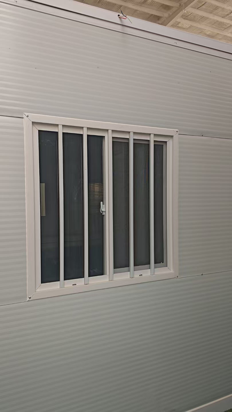 Exterior Image: Portable 19 FT Folding Insulated Container Office with Lockable Door – Outdoor View

Interior Image: Inside View of Modular Prefab Cabin Office with Window and Electrical Plug

Folded View: Foldable Prefab Container for Easy Transport and Setup

Setup Process: Step-by-step Setup of 19 FT Folding Steel Container Office

Multiple Angles: Various Views of the Portable Modular Work Cabin