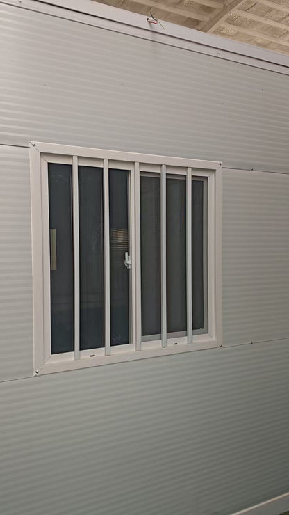 Exterior Image: Portable 19 FT Folding Insulated Container Office with Lockable Door – Outdoor View

Interior Image: Inside View of Modular Prefab Cabin Office with Window and Electrical Plug

Folded View: Foldable Prefab Container for Easy Transport and Setup

Setup Process: Step-by-step Setup of 19 FT Folding Steel Container Office

Multiple Angles: Various Views of the Portable Modular Work Cabin