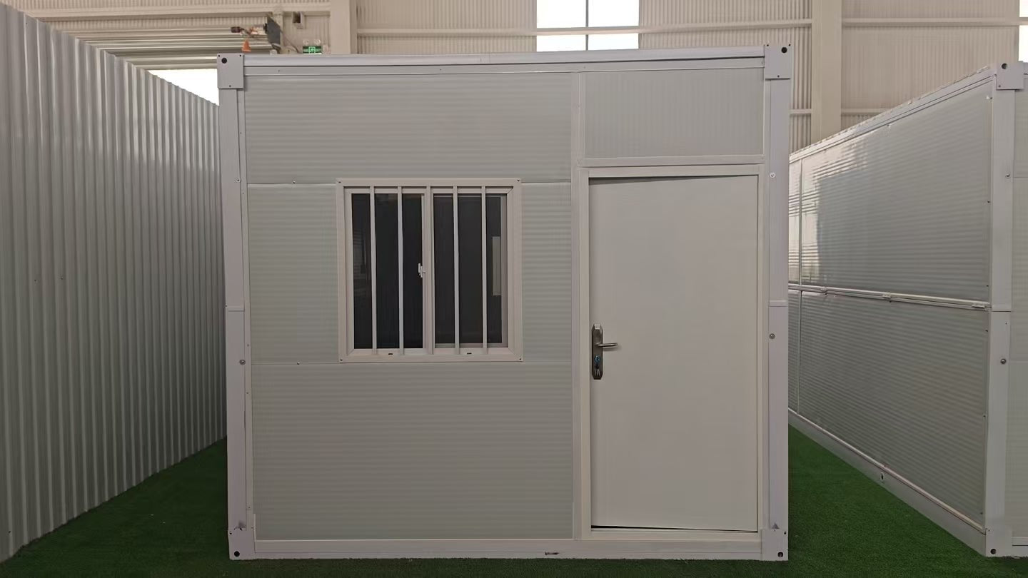 Exterior Image: Portable 19 FT Folding Insulated Container Office with Lockable Door – Outdoor View

Interior Image: Inside View of Modular Prefab Cabin Office with Window and Electrical Plug

Folded View: Foldable Prefab Container for Easy Transport and Setup

Setup Process: Step-by-step Setup of 19 FT Folding Steel Container Office

Multiple Angles: Various Views of the Portable Modular Work Cabin