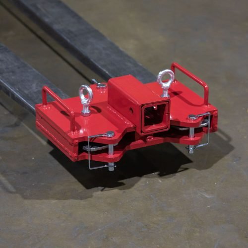 Dual Forklift Hitch Receiver Adapter Mounted on Pallet Fork – Side View

Red Steel Forklift Hitch Receiver for Trailers and Campers

Clamp-On Fork Hitch Receiver Adapter – Industrial Grade

Top View of 2-in-1 Towing Hitch Adapter on Forklift

Pallet Fork Trailer Hitch Attachment with Dual Receiver