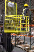 Yellow 2-person forklift safety cage with mesh floor

Forklift lifting steel work platform in industrial setting

OSHA-compliant safety cage with lockable gate

Close-up of forklift cage fork pockets and frame

Overhead maintenance platform for warehouse use