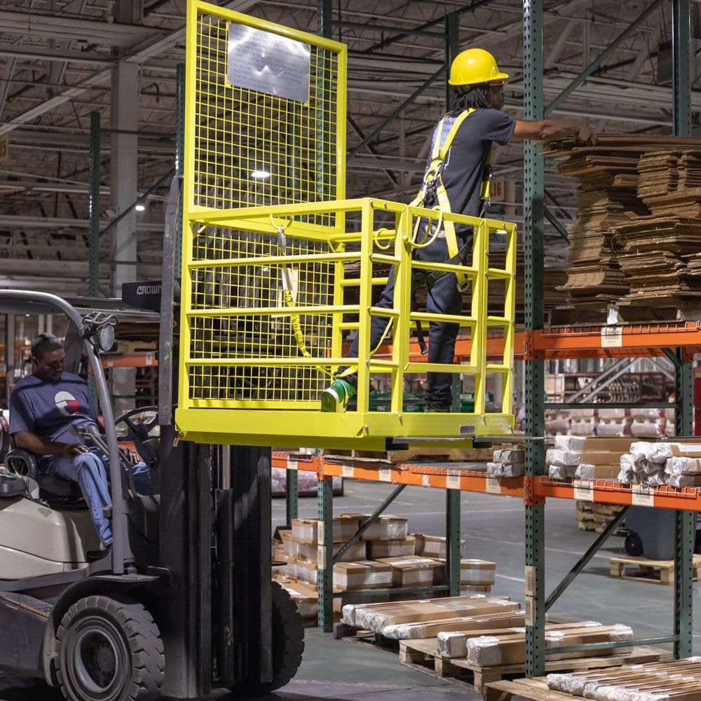 Yellow 2-person forklift safety cage with mesh floor

Forklift lifting steel work platform in industrial setting

OSHA-compliant safety cage with lockable gate

Close-up of forklift cage fork pockets and frame

Overhead maintenance platform for warehouse use