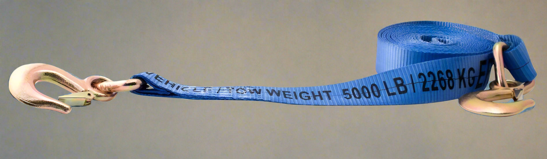 Blue 2” x 20 FT heavy-duty tow strap coiled with hooks

Tow strap close-up showing reinforced hook attachment

Heavy-duty towing strap for 10,000 lb recovery

Compact tow recovery strap in storage configuration