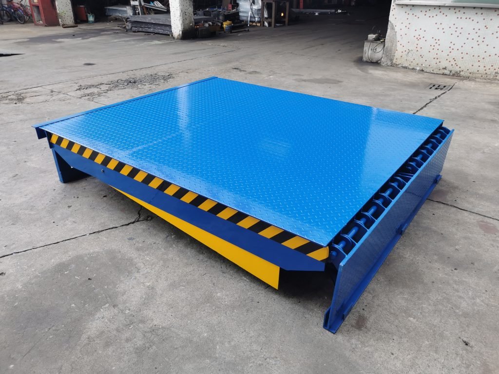 Electric dock leveler ramp with blue powder-coated finish