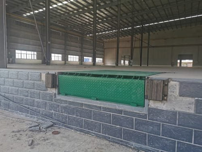 Dock leveler ramp aligning with trailer