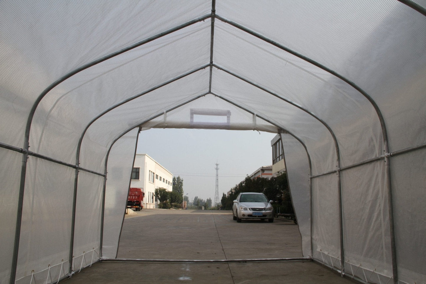 “10x10 walk-in commercial greenhouse with steel frame and canopy”

“Inside view of heavy-duty 10x20 greenhouse for vegetables”

“Zipper door greenhouse for backyard gardening setup”

“Greenhouse tent with reinforced polyester canopy and support frame”