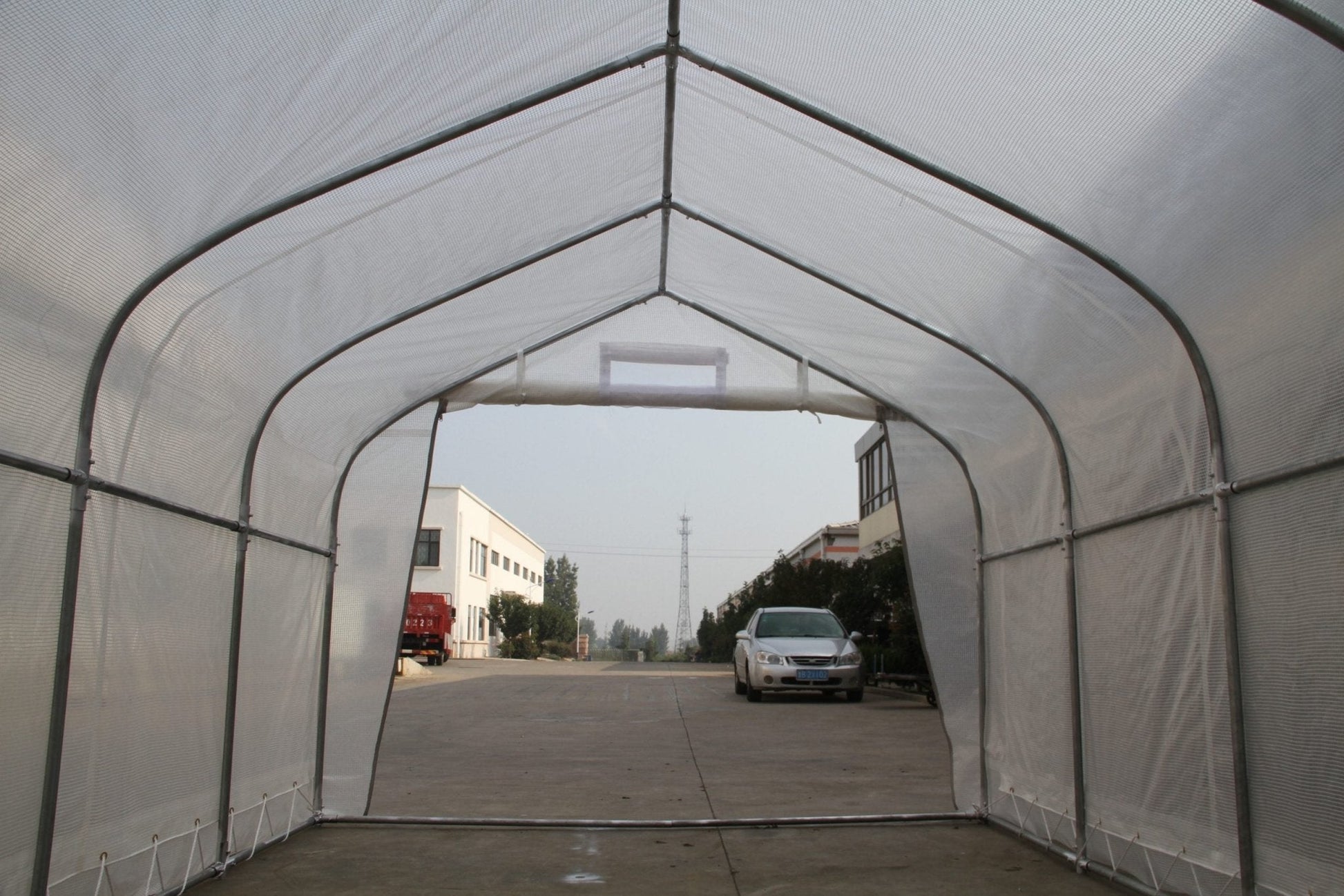 “10x10 walk-in commercial greenhouse with steel frame and canopy”

“Inside view of heavy-duty 10x20 greenhouse for vegetables”

“Zipper door greenhouse for backyard gardening setup”

“Greenhouse tent with reinforced polyester canopy and support frame”