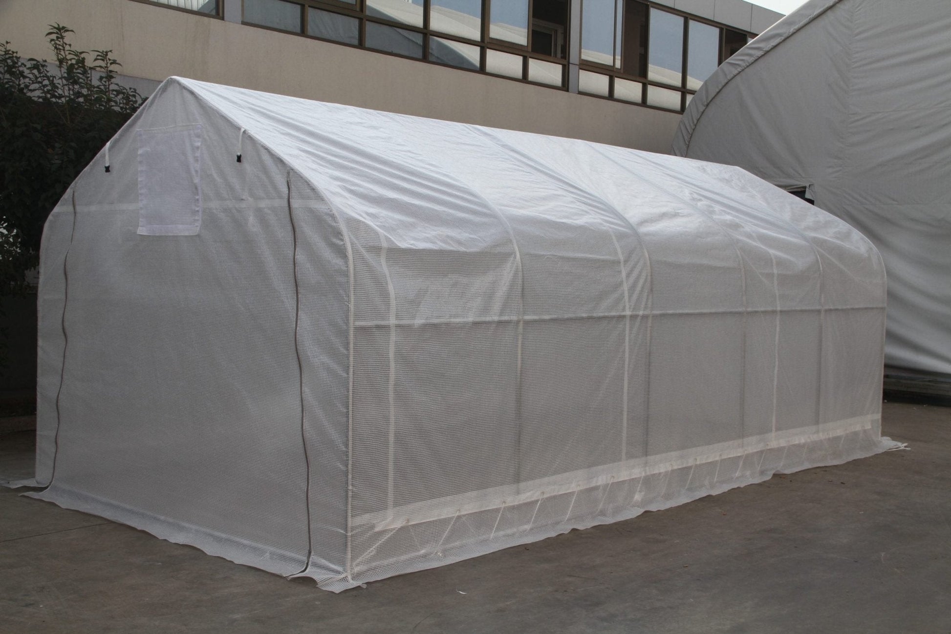 “10x10 walk-in commercial greenhouse with steel frame and canopy”

“Inside view of heavy-duty 10x20 greenhouse for vegetables”

“Zipper door greenhouse for backyard gardening setup”

“Greenhouse tent with reinforced polyester canopy and support frame”