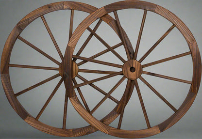 "Rustic wooden wagon wheel 48 inch for garden decor"

"Burnt wood wagon wheel leaning against a fence"

"Farmhouse yard display with decorative wooden wheels"