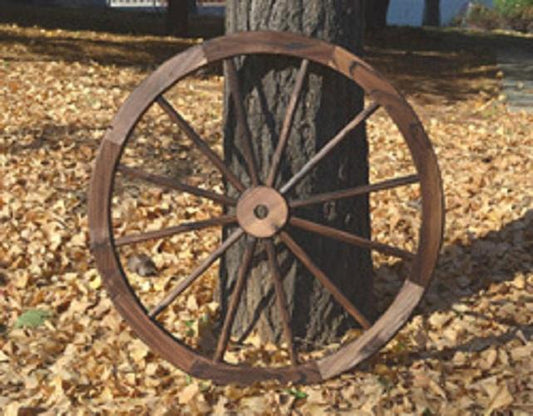 "Rustic wooden wagon wheel 48 inch for garden decor"

"Burnt wood wagon wheel leaning against a fence"

"Farmhouse yard display with decorative wooden wheels"