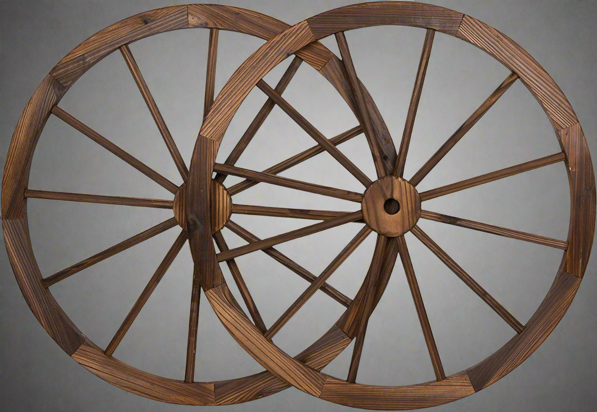 "Rustic wooden wagon wheel 48 inch for garden decor"

"Burnt wood wagon wheel leaning against a fence"

"Farmhouse yard display with decorative wooden wheels"