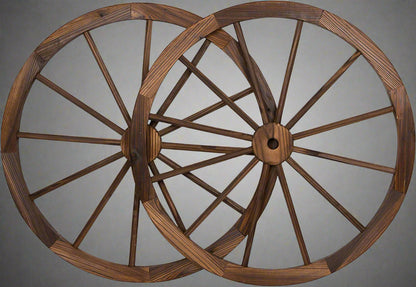 "Rustic wooden wagon wheel 48 inch for garden decor"

"Burnt wood wagon wheel leaning against a fence"

"Farmhouse yard display with decorative wooden wheels"