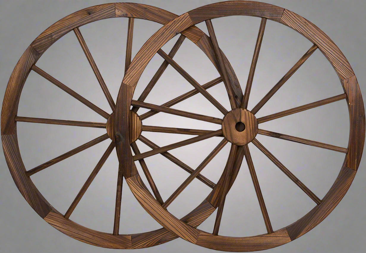 "Rustic wooden wagon wheel 48 inch for garden decor"

"Burnt wood wagon wheel leaning against a fence"

"Farmhouse yard display with decorative wooden wheels"