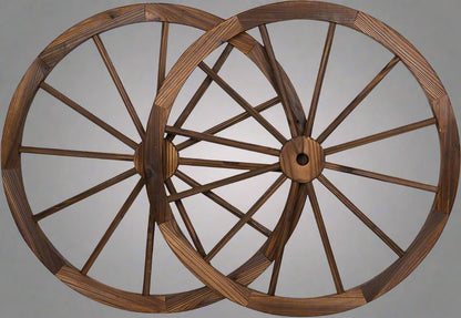 "Rustic wooden wagon wheel 48 inch for garden decor"

"Burnt wood wagon wheel leaning against a fence"

"Farmhouse yard display with decorative wooden wheels"