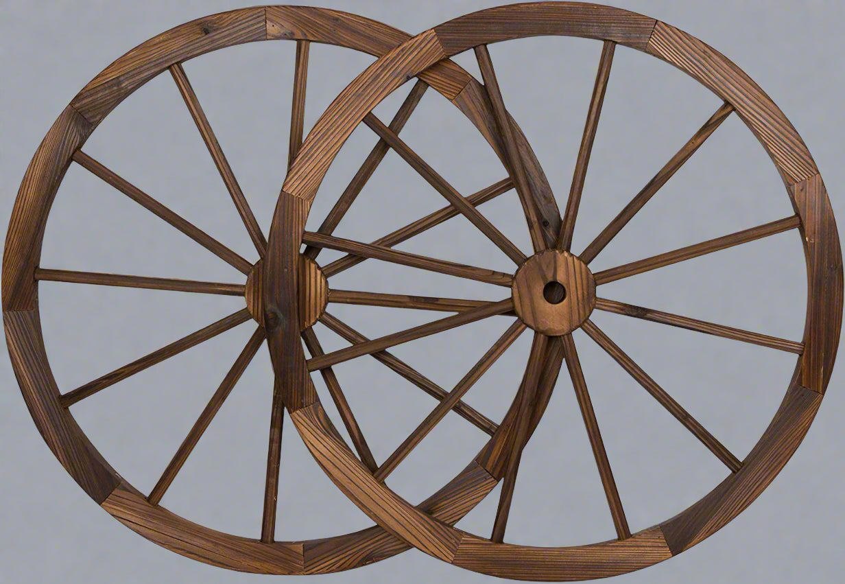 "Rustic wooden wagon wheel 48 inch for garden decor"

"Burnt wood wagon wheel leaning against a fence"

"Farmhouse yard display with decorative wooden wheels"