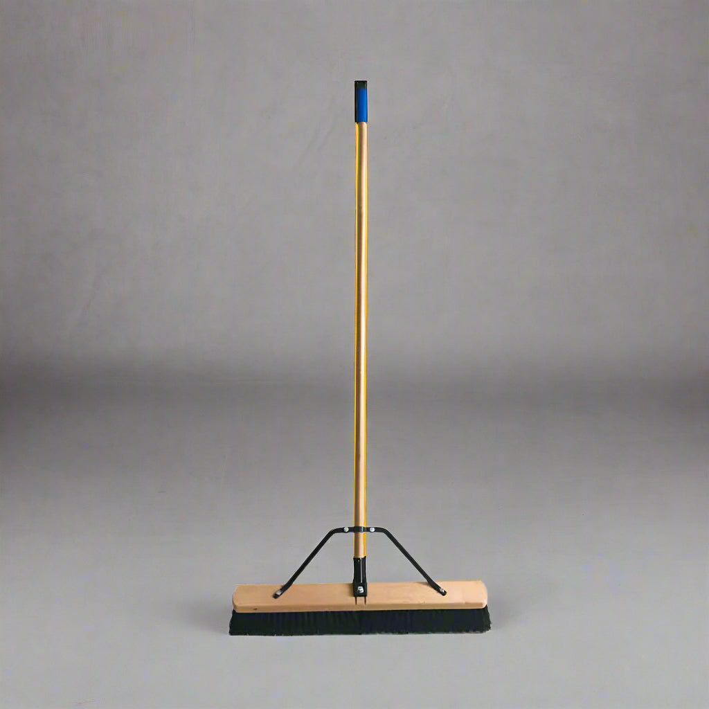 24 inch heavy-duty wood push broom for warehouse cleaning
Shop broom with long wood handle and bristle support brace
Garage floor sweeper for asphalt and concrete debris
Industrial heavy-duty broom with 60 inch handle
Bristled floor broom for outdoor surfaces and driveways