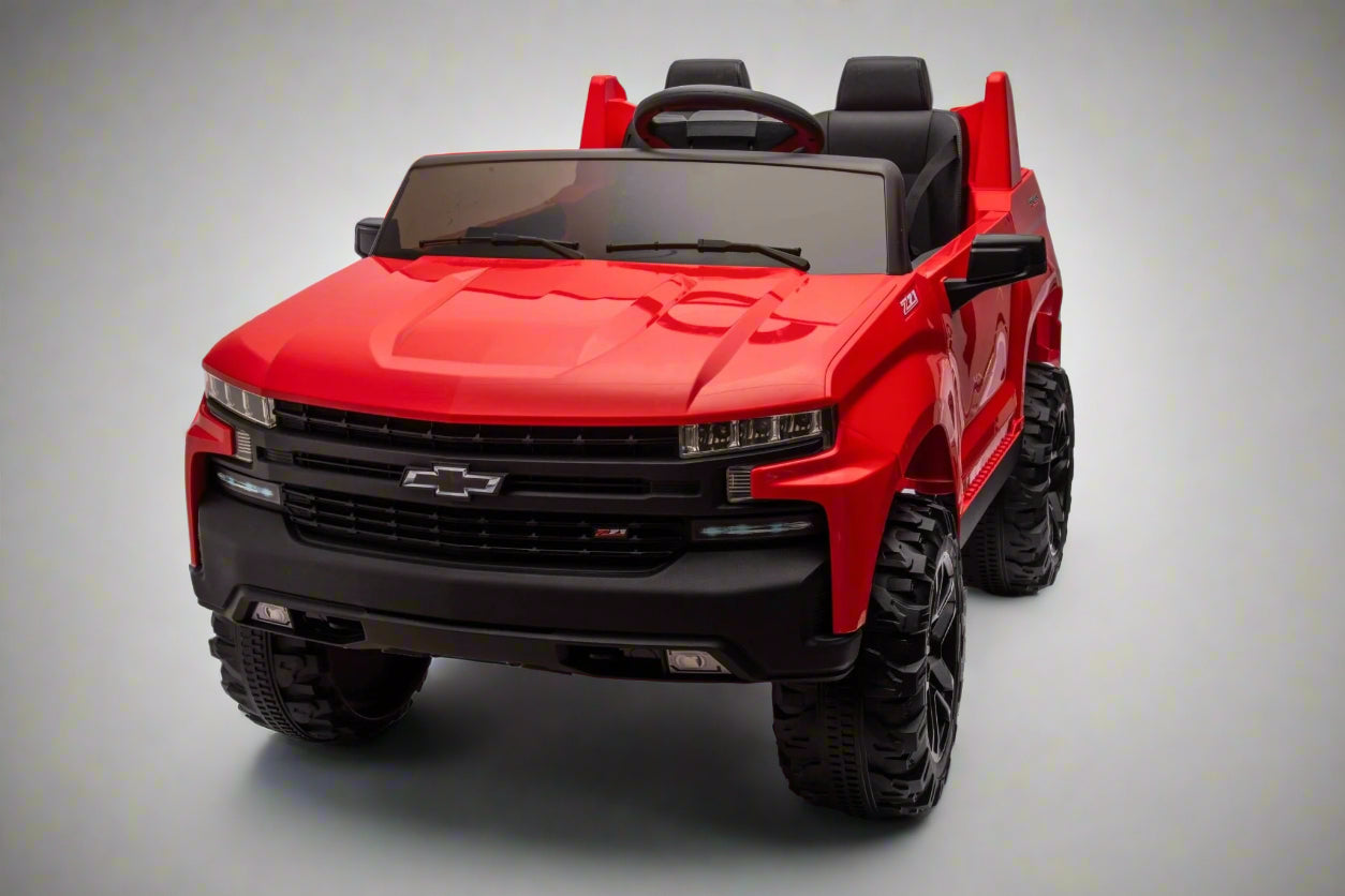 Red Chevrolet ride-on pickup truck for kids with open doors

Front view of Chevrolet kids ride-on with LED lights

Side view of red 24V Chevrolet electric truck toy

Remote-controlled kids electric pickup truck in red

Ride-on truck with Bluetooth and leather seating for children