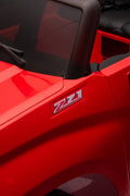 Red Chevrolet ride-on pickup truck for kids with open doors

Front view of Chevrolet kids ride-on with LED lights

Side view of red 24V Chevrolet electric truck toy

Remote-controlled kids electric pickup truck in red

Ride-on truck with Bluetooth and leather seating for children