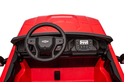Red Chevrolet ride-on pickup truck for kids with open doors

Front view of Chevrolet kids ride-on with LED lights

Side view of red 24V Chevrolet electric truck toy

Remote-controlled kids electric pickup truck in red

Ride-on truck with Bluetooth and leather seating for children