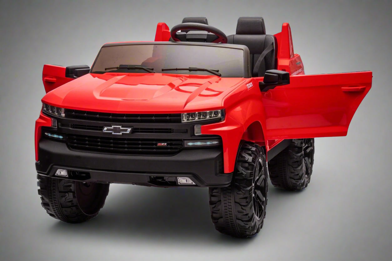 Red Chevrolet ride-on pickup truck for kids with open doors

Front view of Chevrolet kids ride-on with LED lights

Side view of red 24V Chevrolet electric truck toy

Remote-controlled kids electric pickup truck in red

Ride-on truck with Bluetooth and leather seating for children