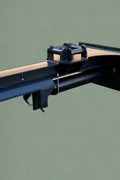 Side view of inverted skid steer log splitter

Front hydraulic wood splitter mounted on skid steer

Splitting log demonstration

Log splitter with couplers and quick attach plate

Hydraulic ram close-up