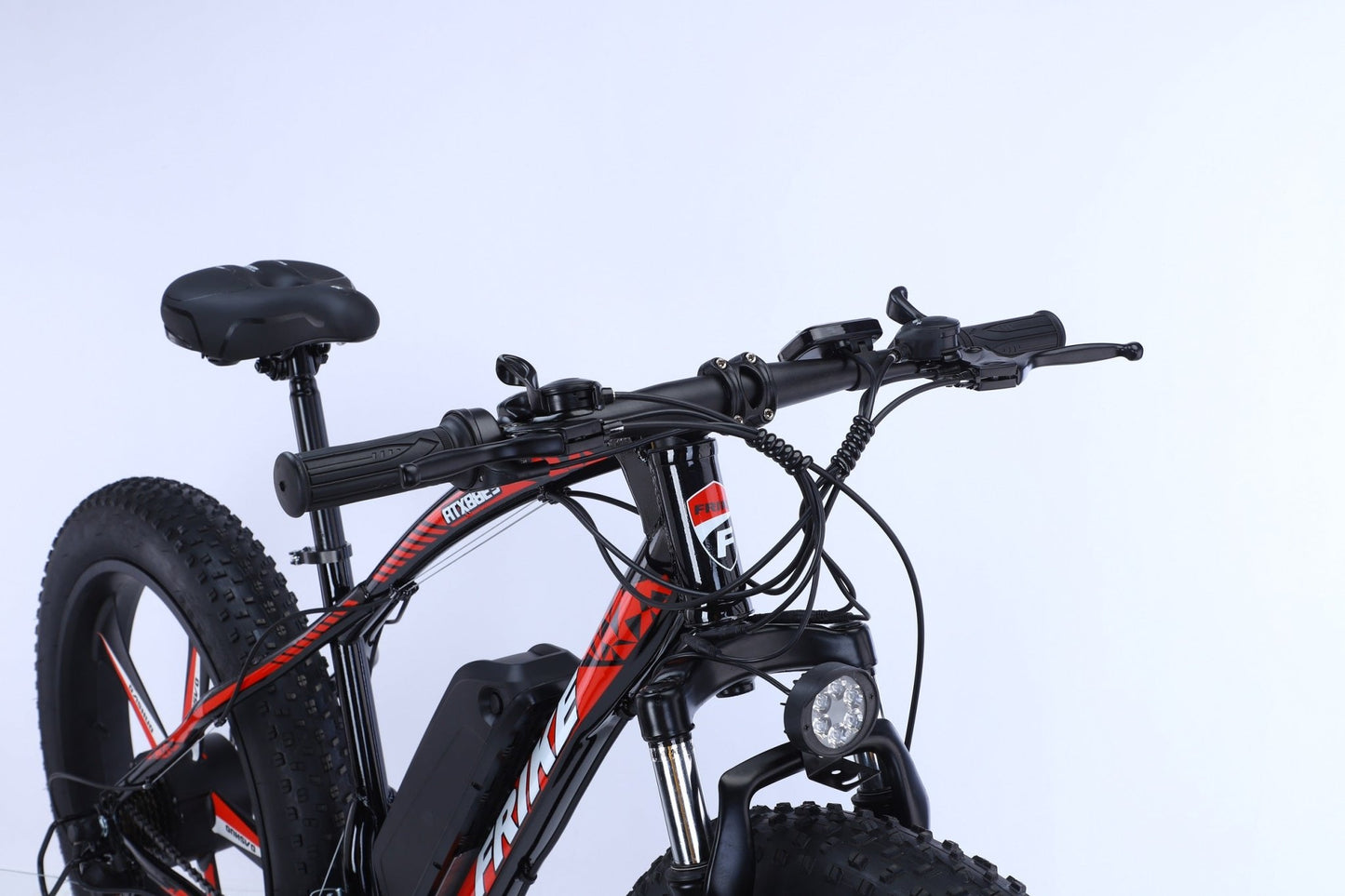 26 inch electric fat tire e-bike with 500W motor and disc brakes
Side view of black all-terrain e-bike with oversized tires
Removable 48V lithium battery on mountain fat tire e-bike
Close-up of rear hub motor and gear system on electric bike
Electric trail bike designed for snow, sand, and rugged terrain
Urban and off-road ready fat tire e-bike with aluminum frame