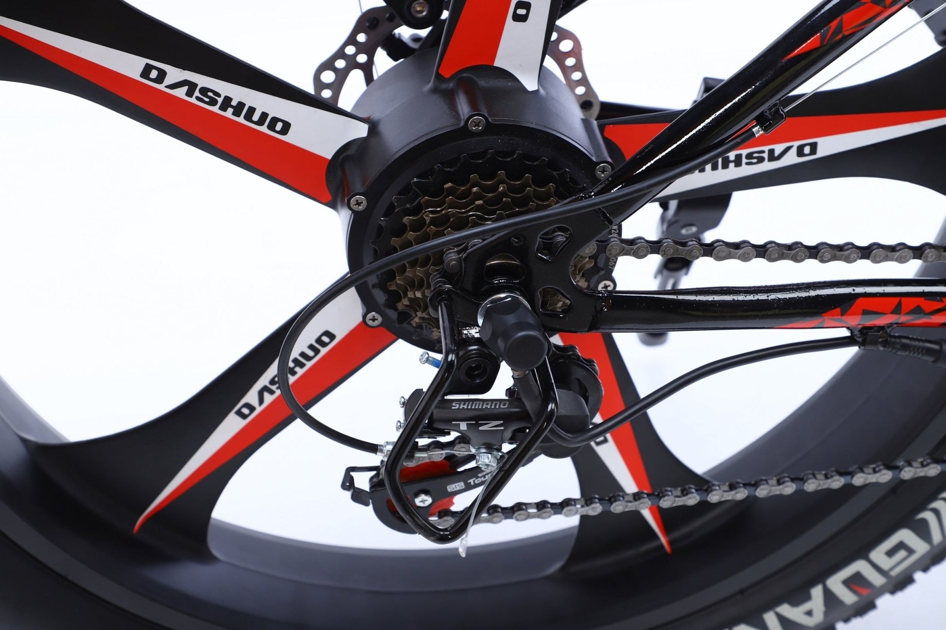 26 inch electric fat tire e-bike with 500W motor and disc brakes
Side view of black all-terrain e-bike with oversized tires
Removable 48V lithium battery on mountain fat tire e-bike
Close-up of rear hub motor and gear system on electric bike
Electric trail bike designed for snow, sand, and rugged terrain
Urban and off-road ready fat tire e-bike with aluminum frame