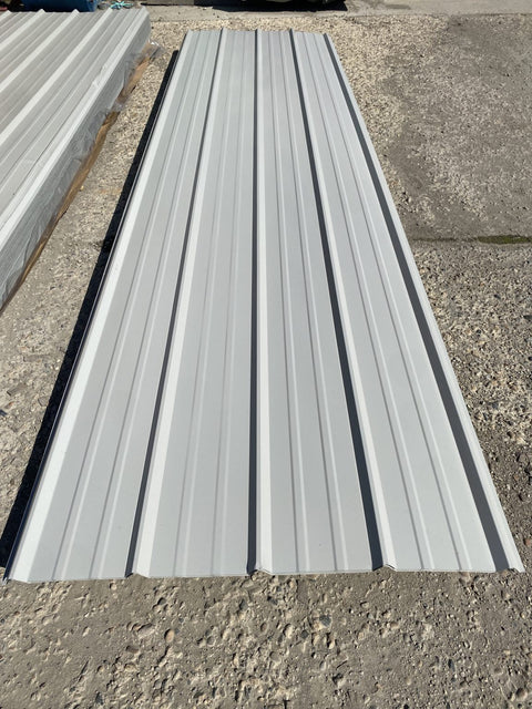 29-gauge steel siding panels in silver finish – side view
Close-up of red metal siding with smooth weather-resistant finish
Full stack of steel siding panels in multiple lengths
29-gauge corrugated siding installed on an exterior wall
Brown, white, and gray siding panel color options for metal exterior
Long 20ft steel panel view – suitable for barn or home