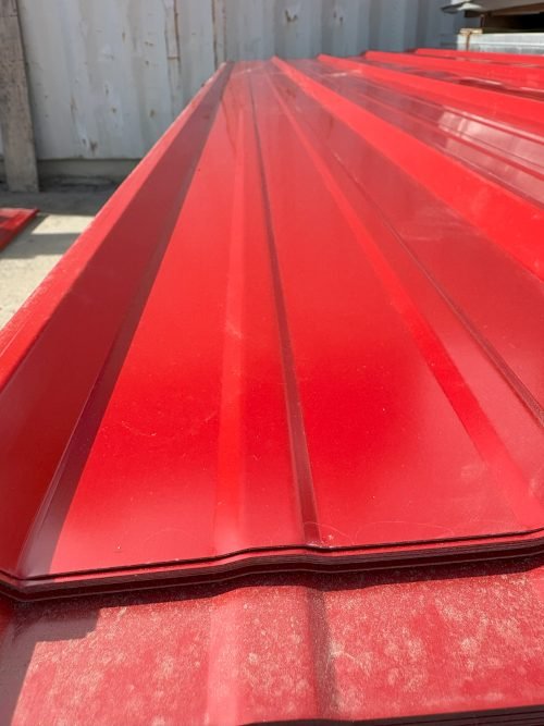 29-gauge steel siding panels in silver finish – side view
Close-up of red metal siding with smooth weather-resistant finish
Full stack of steel siding panels in multiple lengths
29-gauge corrugated siding installed on an exterior wall
Brown, white, and gray siding panel color options for metal exterior
Long 20ft steel panel view – suitable for barn or home