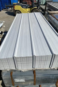 29-gauge steel siding panels in silver finish – side view
Close-up of red metal siding with smooth weather-resistant finish
Full stack of steel siding panels in multiple lengths
29-gauge corrugated siding installed on an exterior wall
Brown, white, and gray siding panel color options for metal exterior
Long 20ft steel panel view – suitable for barn or home