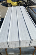 29-gauge steel siding panels in silver finish – side view
Close-up of red metal siding with smooth weather-resistant finish
Full stack of steel siding panels in multiple lengths
29-gauge corrugated siding installed on an exterior wall
Brown, white, and gray siding panel color options for metal exterior
Long 20ft steel panel view – suitable for barn or home