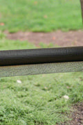 3x15 ft black plastic hardware net roll for garden fencing
Close-up of HDPE chew-proof plastic mesh grid 3/8 inch spacing
Plastic netting around vegetable garden raised beds
Black flexible mesh roll for chicken coops or pet fencing