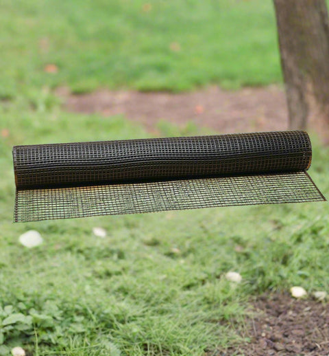 3x15 ft black plastic hardware net roll for garden fencing
Close-up of HDPE chew-proof plastic mesh grid 3/8 inch spacing
Plastic netting around vegetable garden raised beds
Black flexible mesh roll for chicken coops or pet fencing