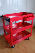Heavy-duty tool cart in garage setup with tools and accessories stored
