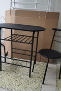 “3-piece black bistro dining set with table and 2 chairs”

“Small space dining set with built-in storage rack”

“Compact black metal dining table and chairs”

“Dining table for apartments and condos with storage”

“Modern 3-piece kitchen table and chairs set”