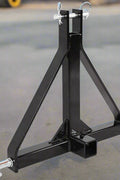Category 1 3-point trailer hitch with 2-inch receiver for tractors
Side view of hitch receiver, black powder-coated steel frame, close-up of lift pins