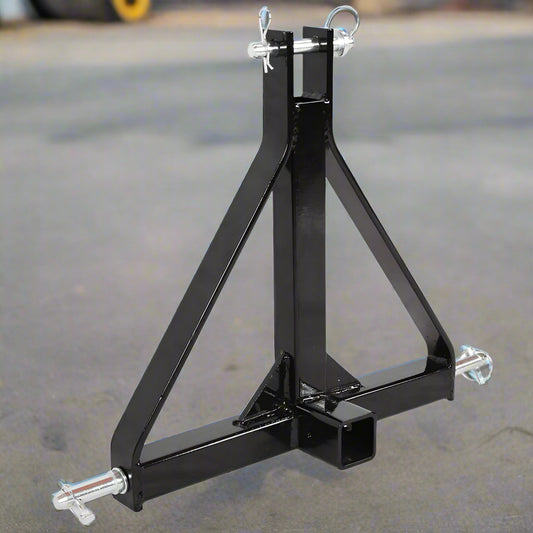 Category 1 3-point trailer hitch with 2-inch receiver for tractors
Side view of hitch receiver, black powder-coated steel frame, close-up of lift pins