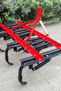 Red 3-point cultivator attachment with shanks and quick hitch
Close-up of heavy-duty hitch frame and shank spacing
Cultivator depth and working width overview