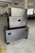 Large steel job box with reinforced lockable lid

3-piece steel job box combo for jobsite organization

Heavy-duty tool storage chest for construction tools

Powder-coated black and gray steel storage boxes set
