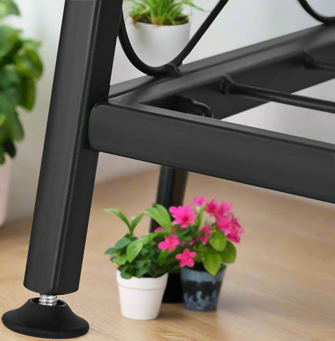 3-tier metal plant stand with potted plants in living room
Black powder-coated plant rack used indoors
Metal flower shelf displayed on outdoor patio
Sturdy decorative stand with three storage tiers
Compact garden shelf holding flowers and décor items
Close-up of black metal frame and assembly