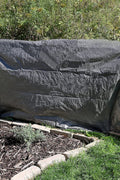 Heavy Duty 10 Mil Silver Tarp folded – Model TA30505
30x50 ft waterproof silver tarp in use as outdoor cover