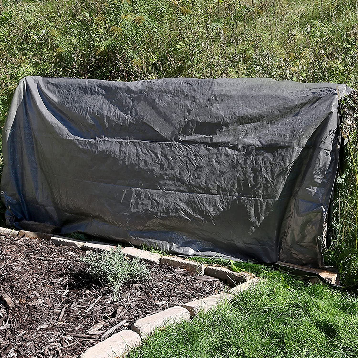 Heavy Duty 10 Mil Silver Tarp folded – Model TA30505
30x50 ft waterproof silver tarp in use as outdoor cover