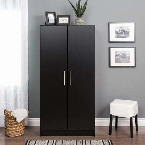 Black 32-inch wardrobe storage cabinet in bedroom
Open wardrobe with hanging rail and top shelf
Modern black wardrobe with brushed handles
32" storage cabinet in office corner
Full-height view of black laminate wardrobe
Side angle of freestanding modern wardrobe