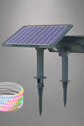 Vibrant multicolor and warm white solar strip lights illuminating pathways