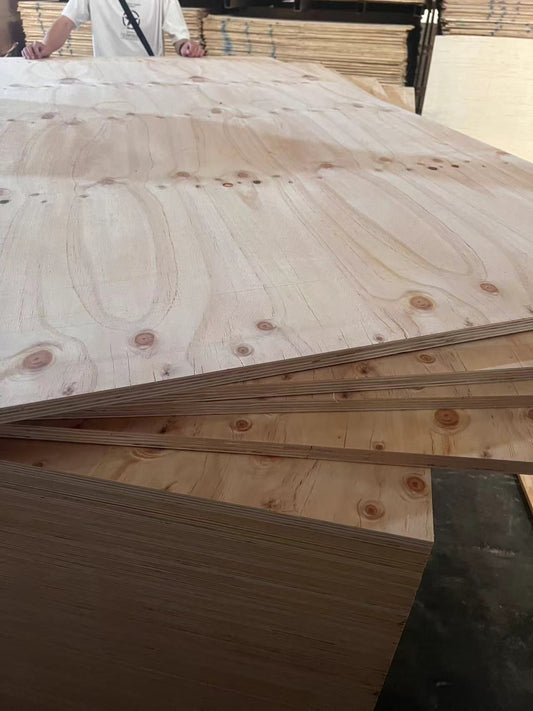 Smooth unmarked pine plywood surface ideal for staining or painting