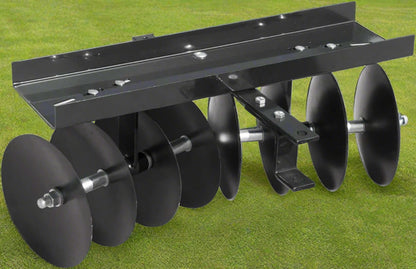 39” tow-behind disc harrow with 8 notched discs – black steel frame
Lawn tractor disc cultivator attachment for garden prep
Tow-behind harrow connected to lawn tractor with pin hitch
Notched disc blades and adjustable angle bracket detail
